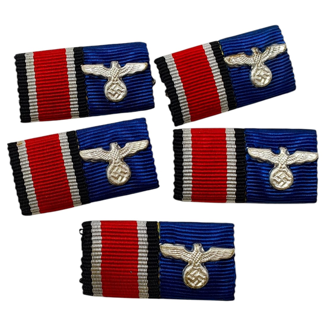 Set of German WWII Ribbon Bars with NSDAP Party Eagle Devices: A set of ribbon bars combining the red-white-black Iron Cross ribbon with the blue Wehrmacht Long Service ribbon, each mounted with a small metal eagle-and-swastika device on the blue portion. The rib