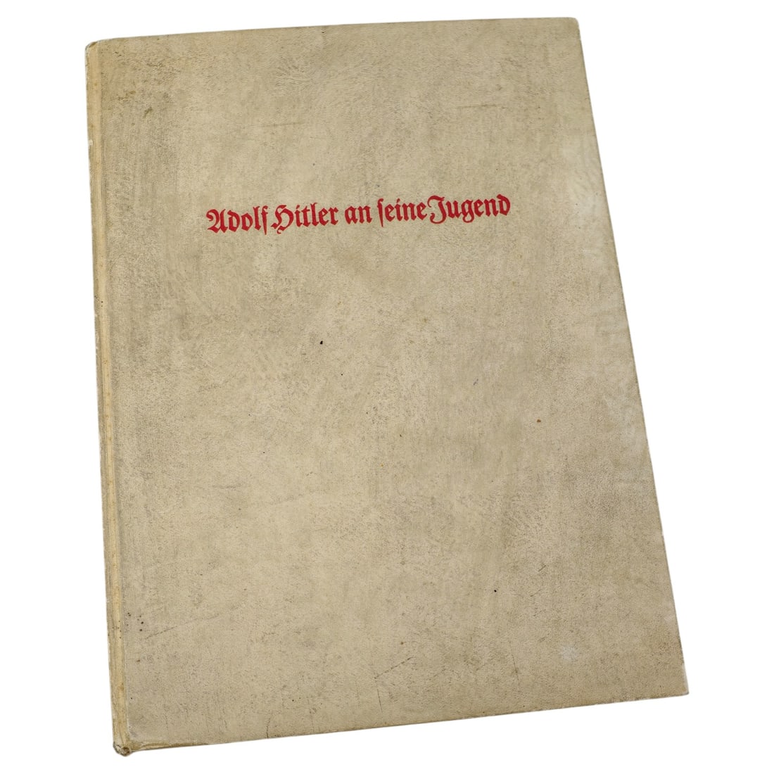 German Third Reich Book "Adolf Hitler an seine Jugend" with NSDAP Deutsches Jungvolk Stamp: A hardbound volume titled "Adolf Hitler an seine Jugend" ("Adolf Hitler to his Youth"), with the title in red Fraktur script on the front board. The interior title page bears a handwritten inscription