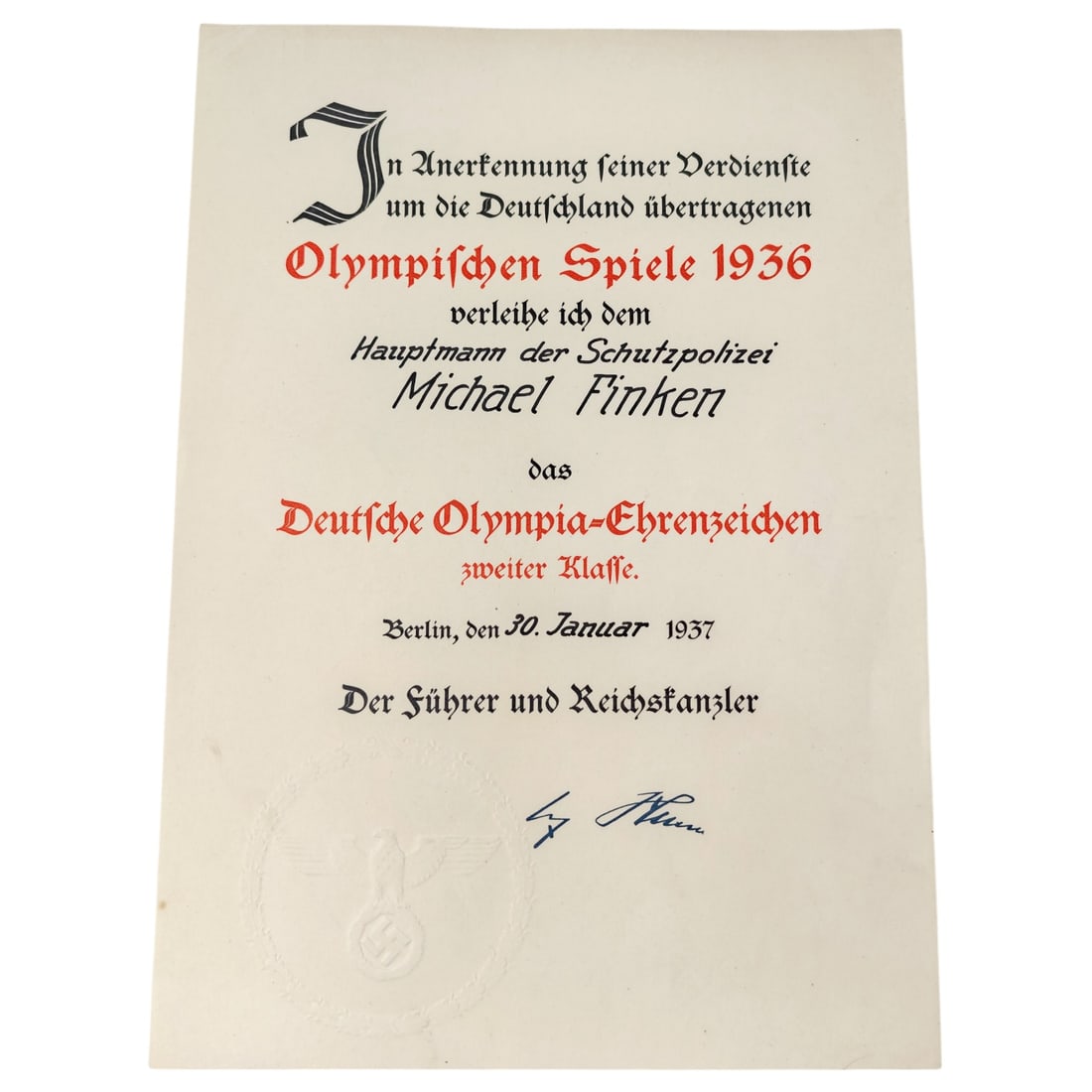 1936 Olympic Games Decoration Award Document to a Schutzpolizei Officer: A printed award citation (Verleihungsurkunde) for the Deutsches Olympia-Ehrenzeichen, 2nd Class, granted in recognition of services rendered in connection with the 1936 Olympic Games held in Germany. 