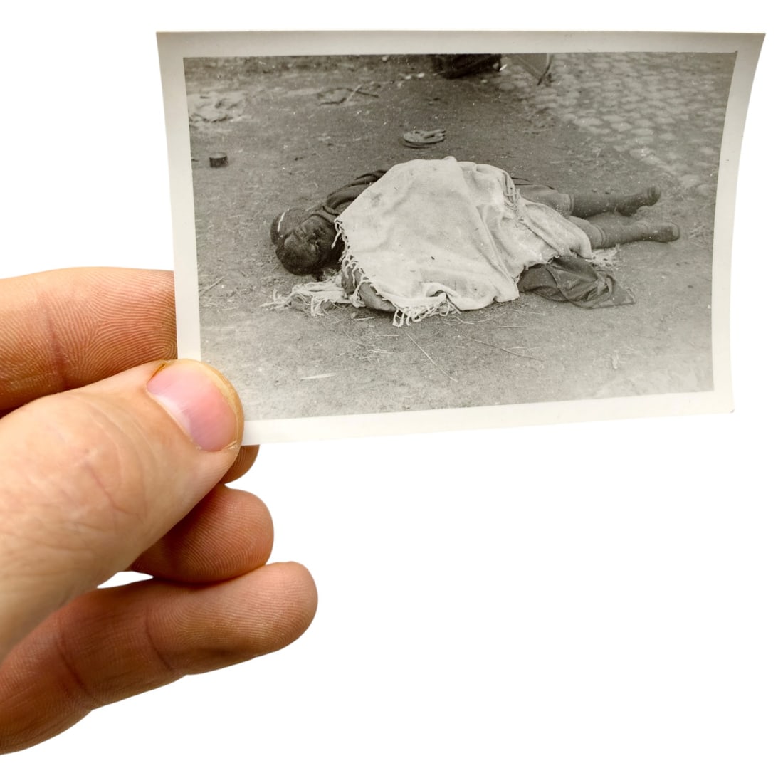 Third Reich Nazi Dutch Photo: Early postwar period (circa 1944–1946).Photo taken by soldiers, journalists, or investigators documenting the civilian toll of war or reprisals following liberation. During the German occupation