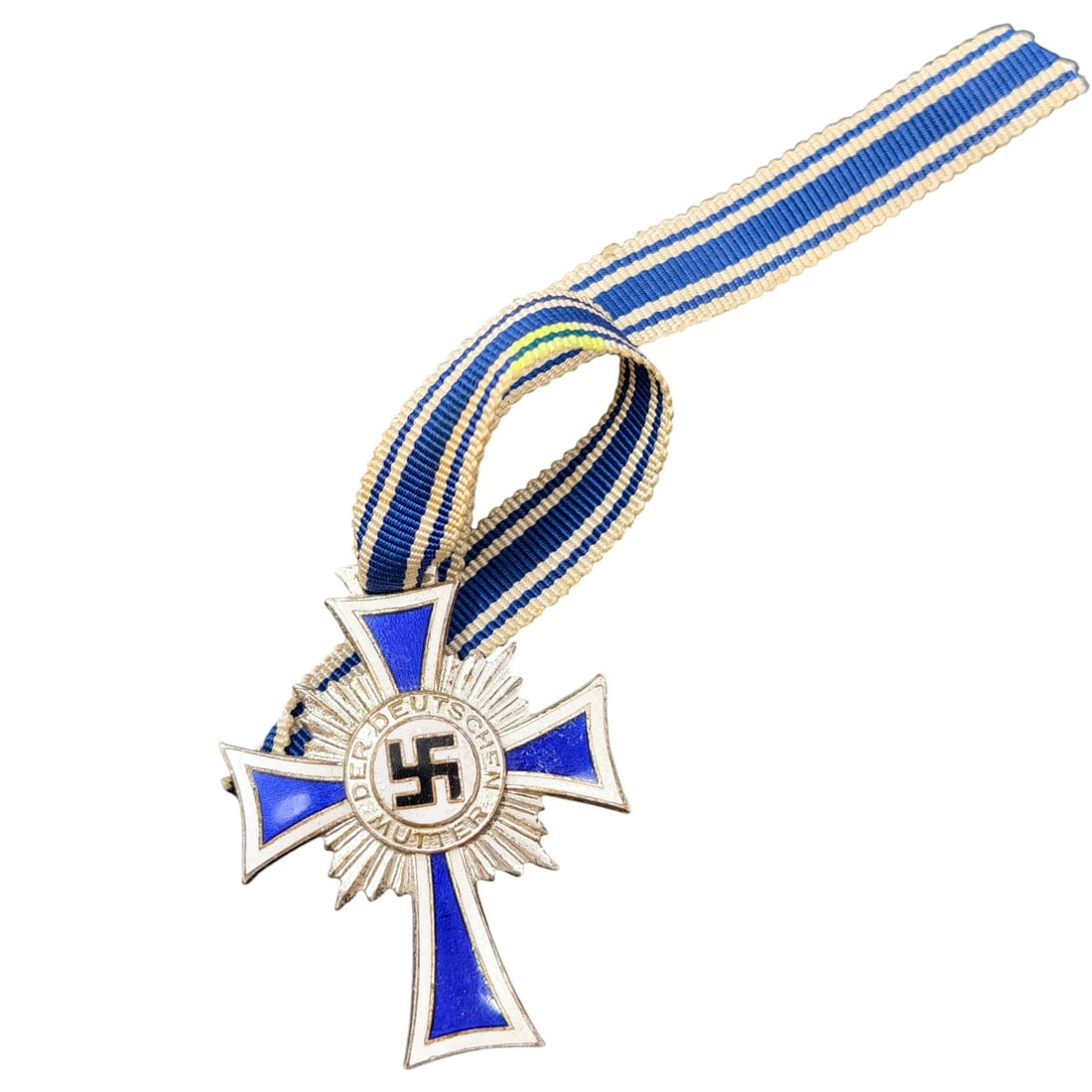 Third Reich German Mothers Cross Silver Grade: A cross-form decoration with blue enamel arms and a central roundel bearing a swastika encircled by the inscription "DER DEUTSCHEN MUTTER," suspended from a blue and white striped ribbon. The reverse 