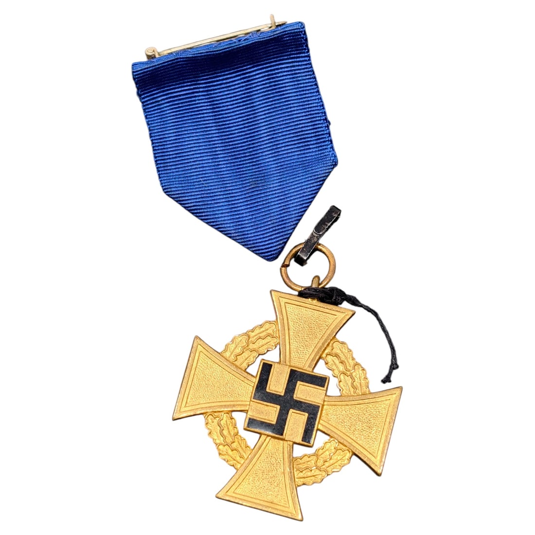 Third Reich 40 Year German Faithful Service Medal : A cross-form decoration in a gilt-finish metal, its arms bordered by an oak-leaf wreath design. One face bears a mobile swastika device set to a raised square field; the corresponding face carries the