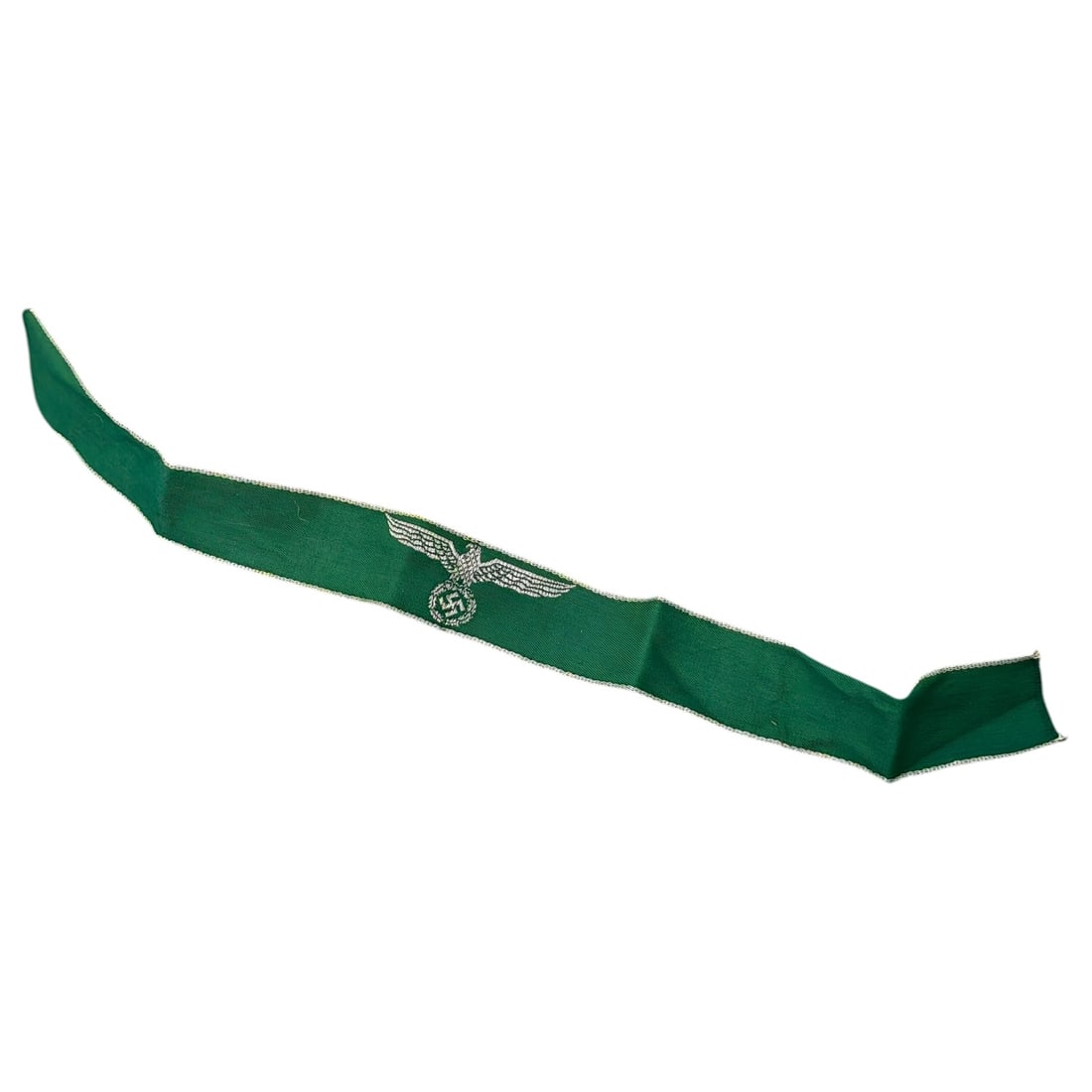 Third Reich German Customs Border Police (Zollgrenzschutz) Cuff Title: Third Reich German Customs Border Police (Zollgrenzschutz) Cuff Title A woven green cuff title with a bordered edge in silver-toned thread, bearing a repeated eagle-and-swastika emblem woven in silver