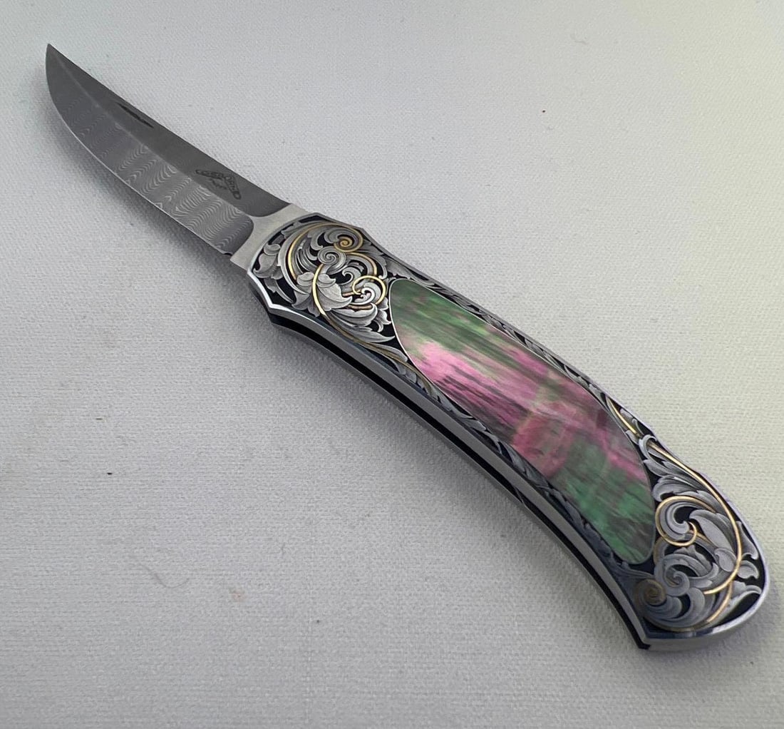 Made by Warren Osborne: Blade Length: 2 3/4 inches Frame Length: 3 1/2 inches Blade Steel: Damascus