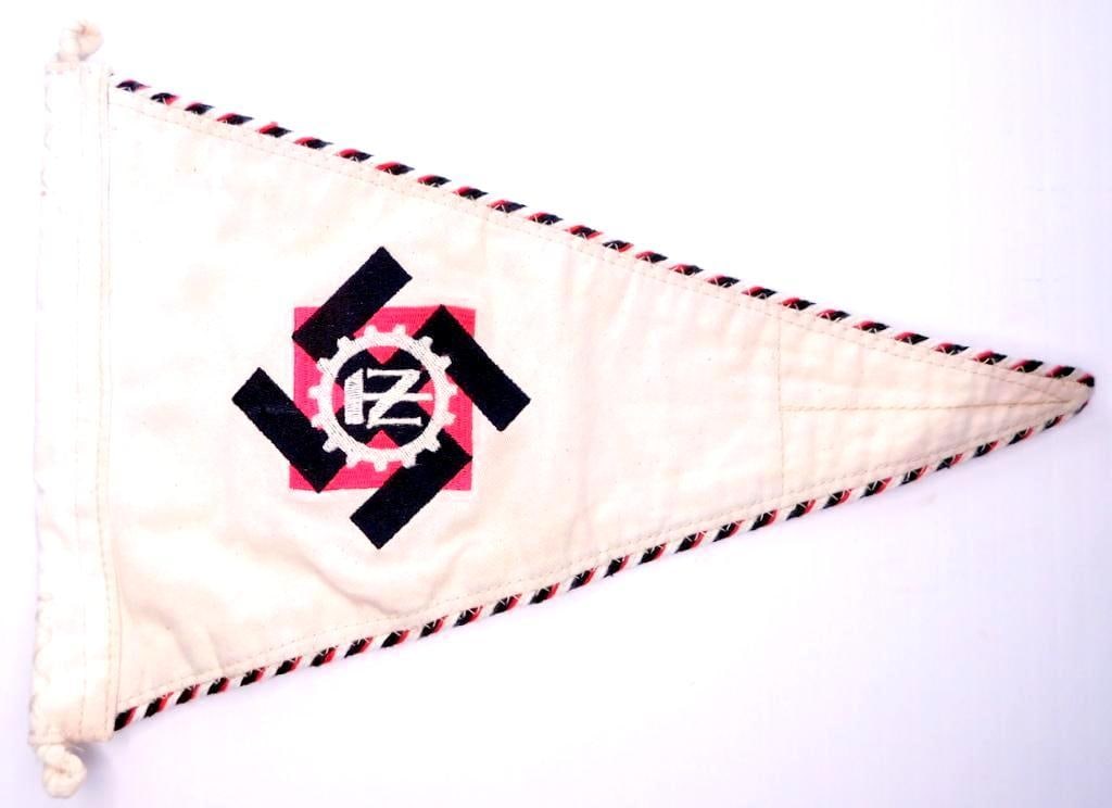 German WWII Technical Emergency TENO Pennant: Shows the cog wheel with an N and a hammer in the center. Swastika in the background. Red, white and black piping around the edge. Reinforced cotton bunting at the top with two rope eyelets. Double si