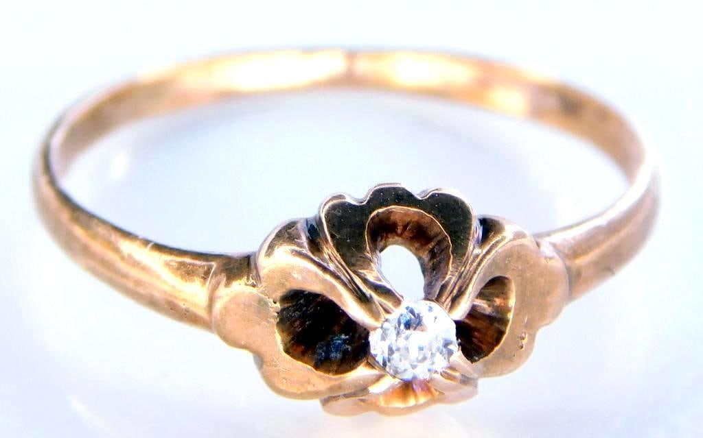 Childs 10K Yellow Gold and Diamond Ring: Classic looking gold and diamond ring Tested 10K Gold, weighs .75 dwt In house tested as real diamond 3 1/2 Size