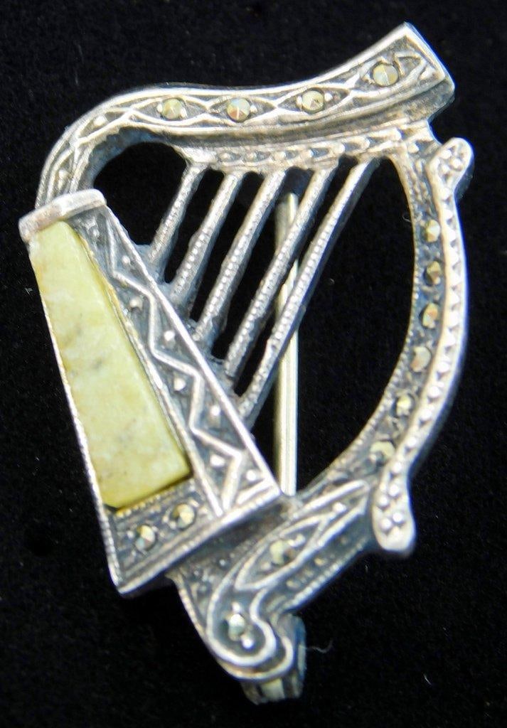 Harp Pin Back Brooch: Possibly Sterling Silver, and Jade Hallmark with final of three characters looking like a Y, unsure what the mark is, illegible to us Shows very well, good looking vintage jewelry 1 inch T 2.95 dwt