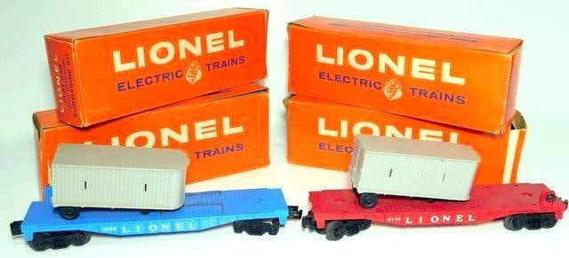 Lionel Flatcar Grouping, (2):  You get all shown here Includes two flatcars No. 6440 and 3330 Also included are two trailers in very good condition as shown These do not match the trailers O Gauge sized