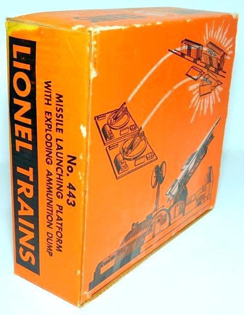 Lionel No. 443 Missle Launching Platform with Exploding Ammunition Dump w/ Box: Large model railroad set Looks so cool Cold War era design Includes two launchers Radar dish appears to have insert post broken off Missle has two broken fins Plastic construction with lots of detail 