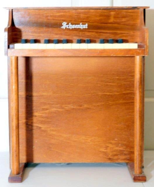 Vintage Wooden Schoenhut 25-Key Upright Toy Piano: Working child's piano By desirable maker Schoenhut Is a playing/working instrument Made in the 1960's-'70's in the U.S. Perfect for any young musician Very good condition Quality find Measures 17 inch