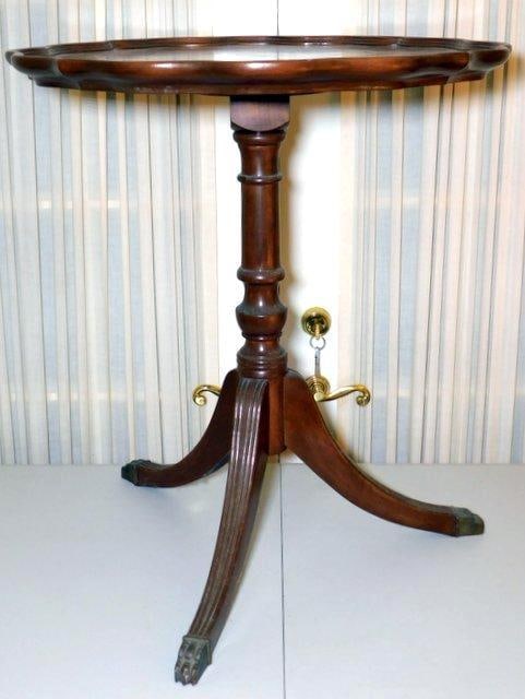 Mahogany Pie Crust Edge Side Table: Beautiful Duncan Phyfe-style furniture Three-leg base with brass claw feet Nice estate furniture piece ready to enjoy in your home Measures 23-1/2 inches W x 26-1/2 T