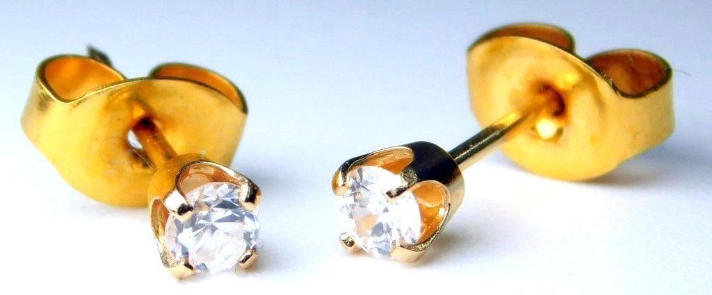 14K Gold Stud Earrings w/ Glass Gemstones: Marked 14K Sparkly, even though tested as glass Safe stand-in for your diamonds Pair of gold stud earrings featuring glass gemstones set in prong settings Weight is .4 dwt Earrings are designed with b