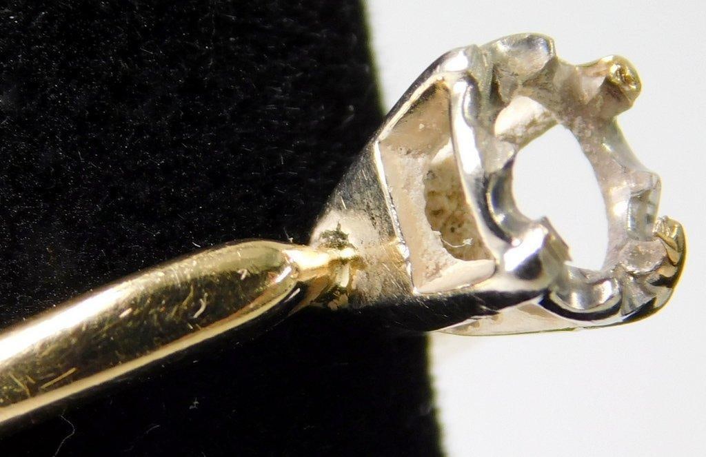 14K Gold Band w/ Setting, No Stone: 14K yellow gold band featuring a six-prong white metal setting designed to hold a stone Band is stamped 14K Weighs 1.65 dwt No stone set in the prong mount Set new stone, or scrap for gold 