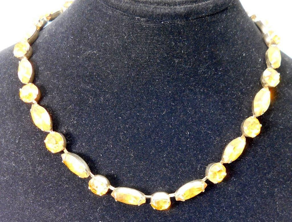 Eisenberg Signed Costume Jewelry Choker Necklace: Great looking necklace with amber glass beads Sought after designer Eisenberg as signed on clasp Clasp is broken as shown Classy look to it Get it here