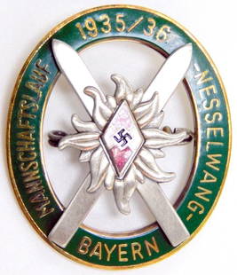 1935/36 Alpine Hitler Youth HJ Bayern Ski Badge: Three-piece four-domed rivet nickel and brass construction with enamel. Front reads Mannschaftslauf 1935/36 Nesselwang Bayern. Shows a Hitler Youth diamond in the center with Edelweiss and crossed