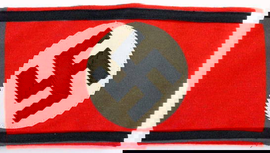 German WWII Waffen SS Shultz Staffel Swastika Arm Band: Multi-piece machine sewn wool and cotton construction. Front shows a swastika in the center of a white circle on a red rectangular background. Black strip along the top and the bottom borders. Two