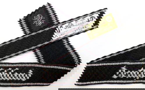 German WWII Waffen SS Deutschland Officers Cuff Title: Raised silver bullion wire hand-embroidered onto a black ribbed cotton backing. Front reads Deutschland. Six flat silver bullion wire strands along the top and the bottom borders. There is an SS RZM