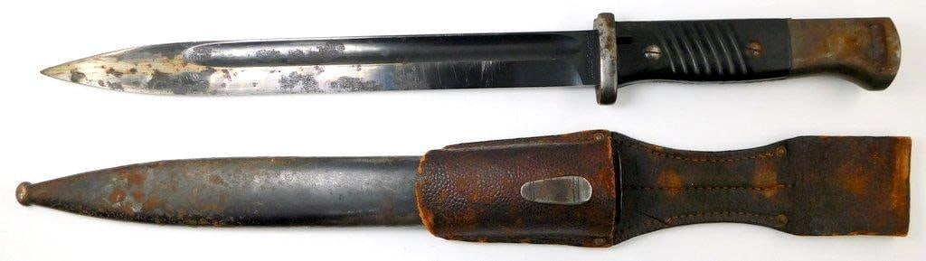 Mauser K-98 Combat Rifle Bayonet and Scabbard: Measures 16 inches long overall. The blued steel blade is numbered and maker marked 1383 b Elite - Diamant. It is also dated 40 on the top of the spine. Blade measures 1 inches wide by 9 7/8 inches lo