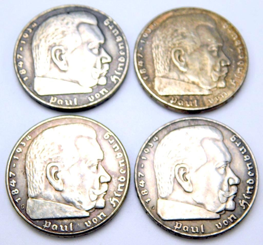 German WWII Chancellor Paul von Hindenburg 5 Mark Silver Coins: Excellent condition. Die-struck construction. Front reads Paul von Hindenburg 1847 1934 and a bust profile image of him in the center. Reverse shows a German eagle clutching a swastika in his tal