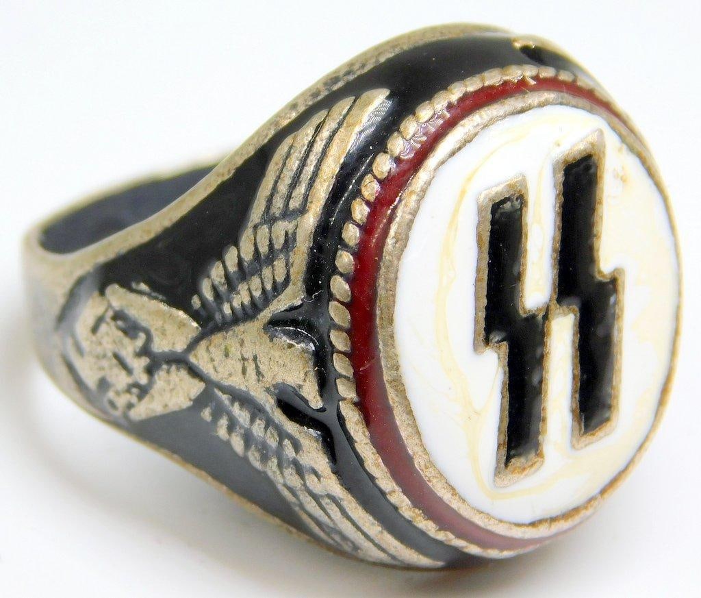 Waffen SS Officers Ring: Silver construction with red, white and black enamel. Front shows a pair of Waffen SS runics in the center. Emblem is flanked by a spread-winged German eagle clutching a swastika in his talons on each