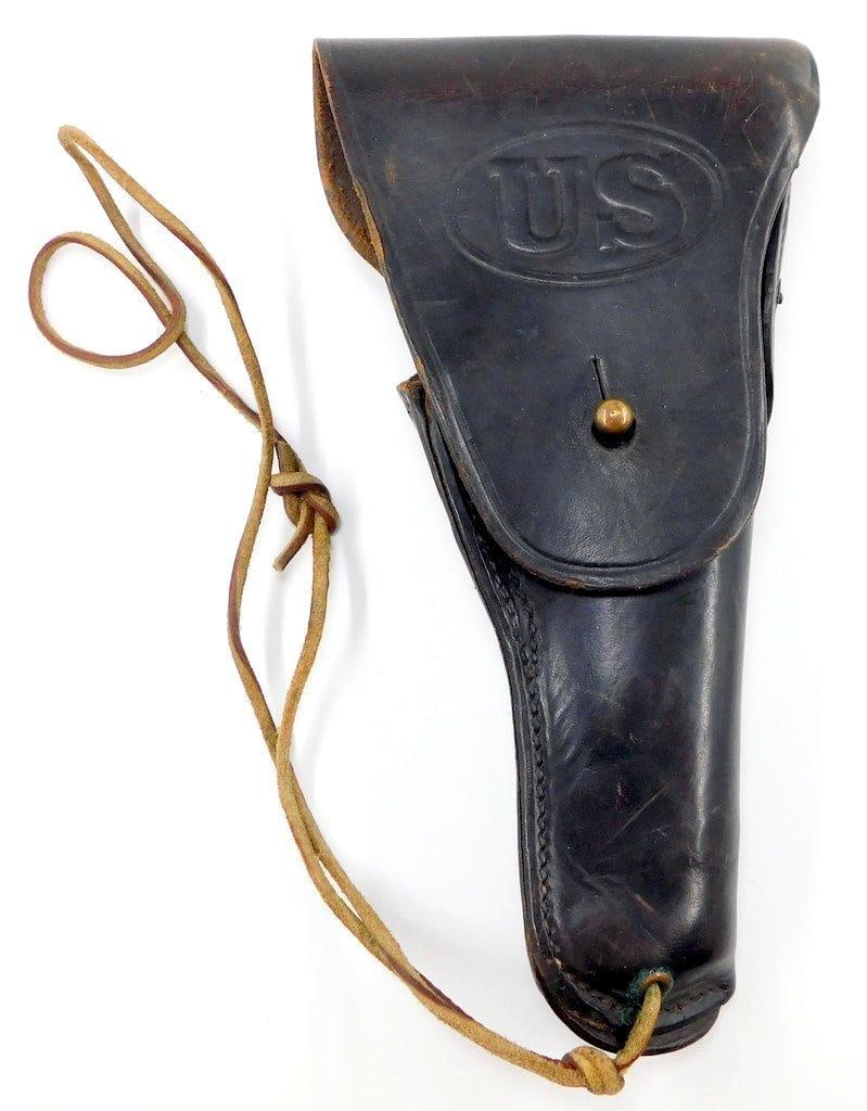 US WWII Army Colt 45 Leather Pistol Holster: Multi-piece machine sewn and riveted leather construction. Front flap is marked US. Metal belt hook on the back. Reverse is maker-marked and dated Sears 1942. Includes the leather lanyard. Measures 5 