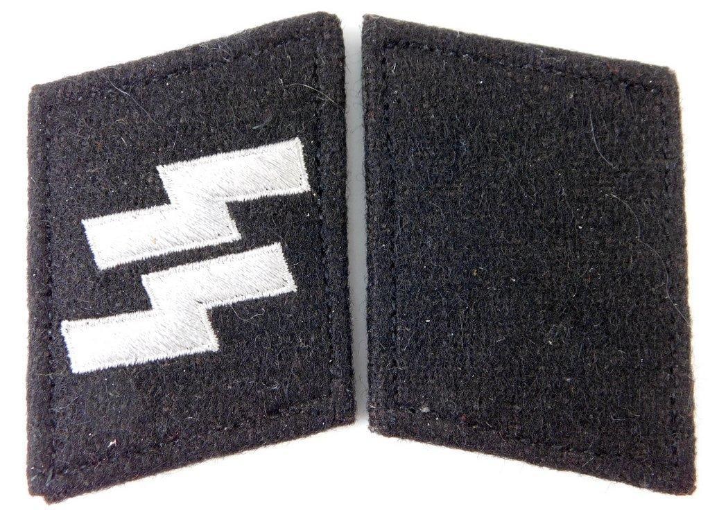 Pair of German WWII Waffen SS EM Collar Tabs: These were removed from the tunic. Machine-embroidered in gray thread onto a black wool base. Front of the right collar tab shows a pair of Waffen SS runics. Left collar tab is blank. Reverse of both 
