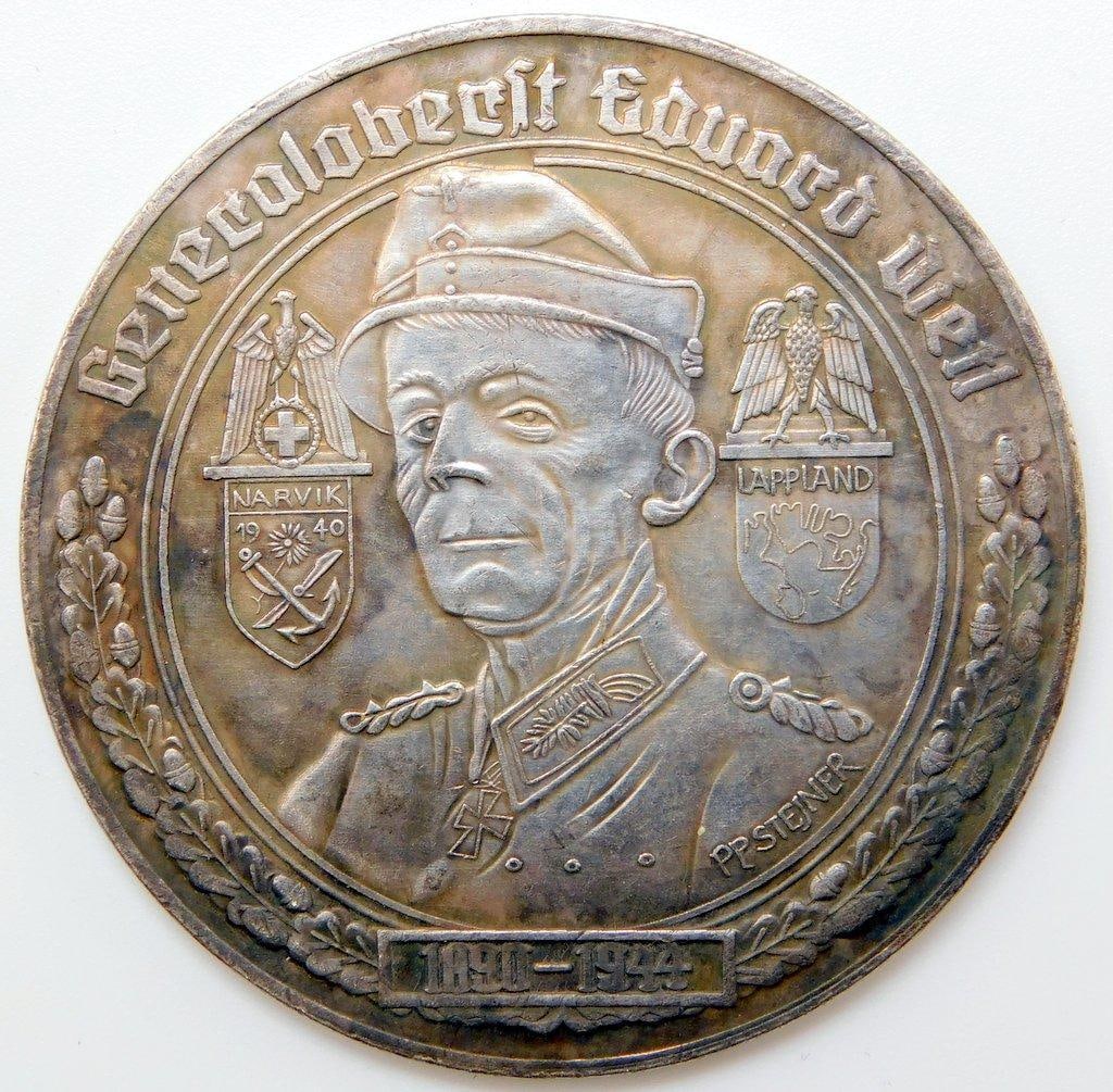 2 Weltkrieg 1939 - 1945 General Dietl Table Medal: One-piece die-struck nickel construction. Front shows a spread-winged eagle clutching a Red Cross in its talons. Reads 2. Weltkrieg 1939 1945. Reverse shows a bust image of Generaloberst Dietl in the 