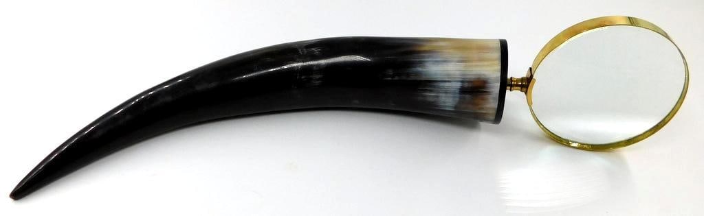 Decorative Magnifying Glass w/ Polished Horn Handle and Brass Fittings: Magnifying glass featuring a unique handle crafted from polished horn The lens is framed in brass and securely attached to the horn with a brass connector Must have for office or library desk Conditio