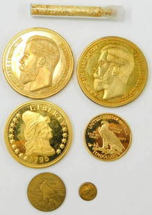Reproduction Gold and Commemorative Coins: These are Repro Coins Reproduction gold-colored coins and tokens featuring various historical designs, including coins marked COPY&nbsp;such as a 1795 Liberty, 1933 Indian Head designs, and a 50 Kopec