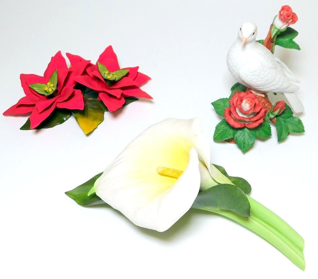 Fine Porcelain Figurines - Fabari, Lenox (1996 Christmas Dove), Anne Marie Trechslin: Three decorative figurines: Fabari poinsettia arrangement, Lenox 1996 Christmas Dove with roses, and a Calla Lily & the Dragonfly porcelain piece by Anne Marie Trechslin All items are crafted from