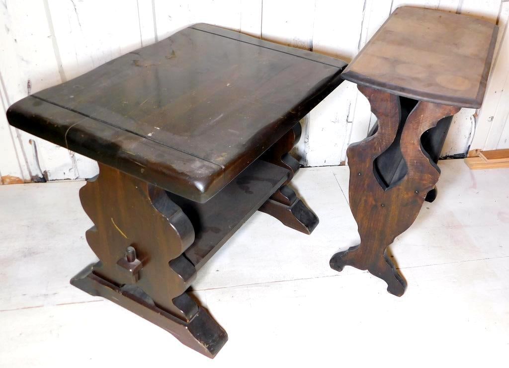 Wooden Side Tables w/ Carved Bases: Both tables feature a lower shelf for additional storage or display The tables show signs of wear, including surface scratches, discoloration, and chipped edges, consistent with age and use The wood h