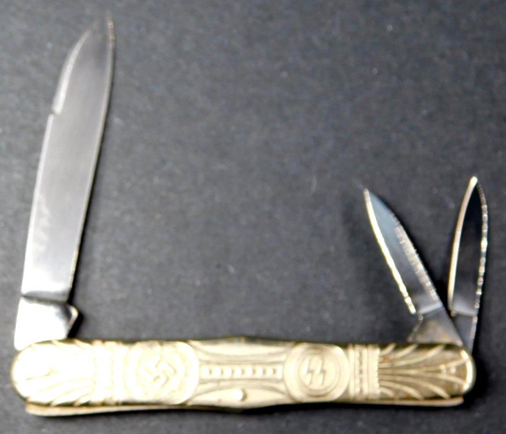 German WWII Waffen SS Pocket Knife: German WWII Waffen SS Pocket Knife Measures 7 7/8 inches open, 3 5/8 inches closed This item is from a lifelong serious knife collector Two piece two rivet nickel construction with three steel