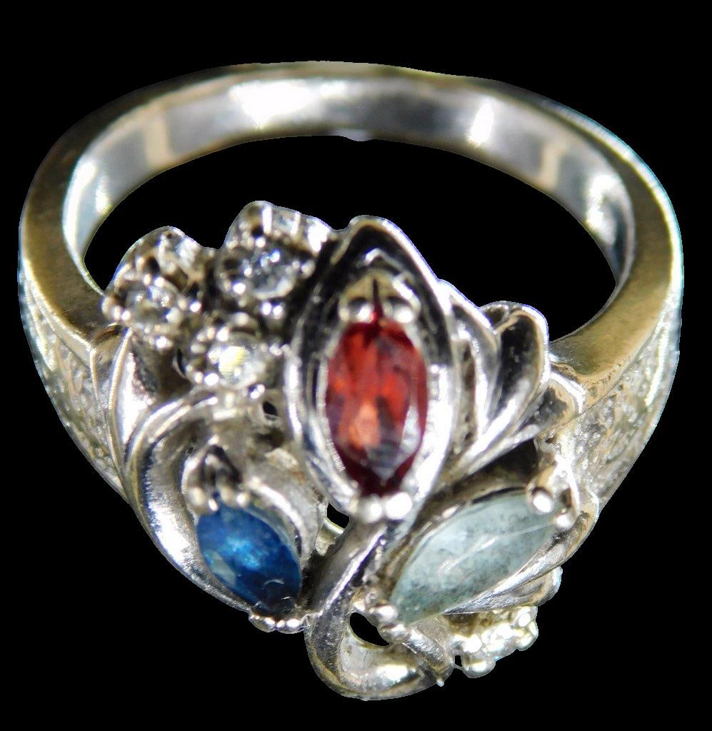 14K Gold Ladies Ring w/ Semi-Precious Stones: Colorful white 14K gold ring Adorned with Aqua, Tanzanite, and Topaz stones, which show so very well 8 3/4 size 6.0 dwt Marked 14K