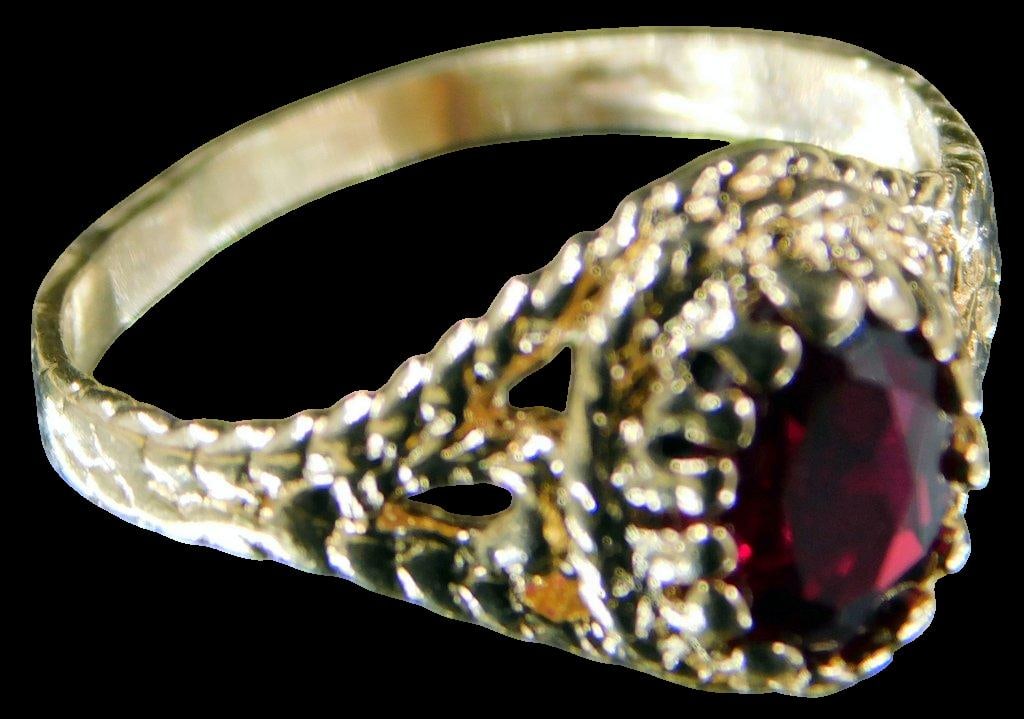 14K Gold Child's Ruby Ring: Beautiful 14K yellow gold with Ruby setting Ornate ring design Stone shows very well Ruby tested Marked 14K 1.2 dwt Perfect for the newer jewelry lover in your life