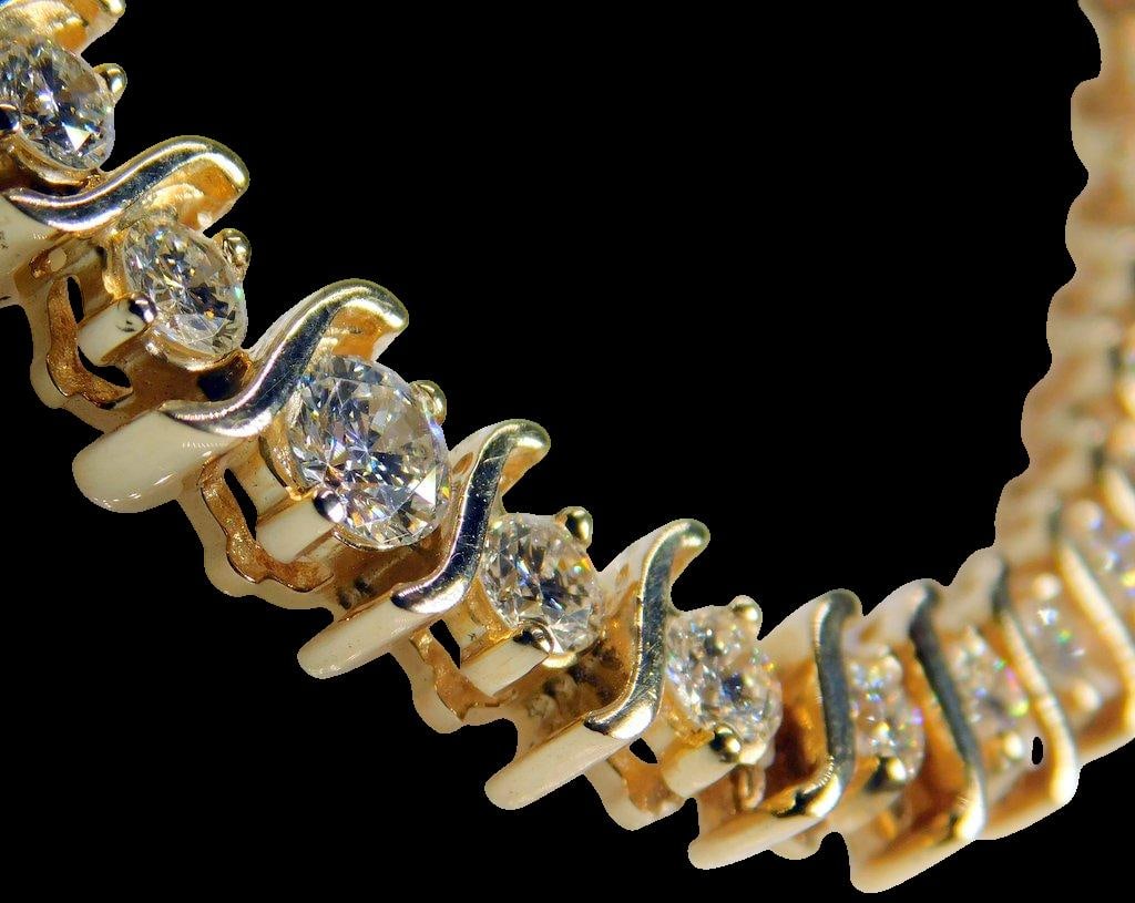 14K Gold Diamond Tennis Necklace: As fine a piece of jewelry as you may find Yes, it is that impressive! Information from jewelers appraisal as shown in the photos: 14kt gold diamond tennis necklace featuring brilliant-cut diamonds in