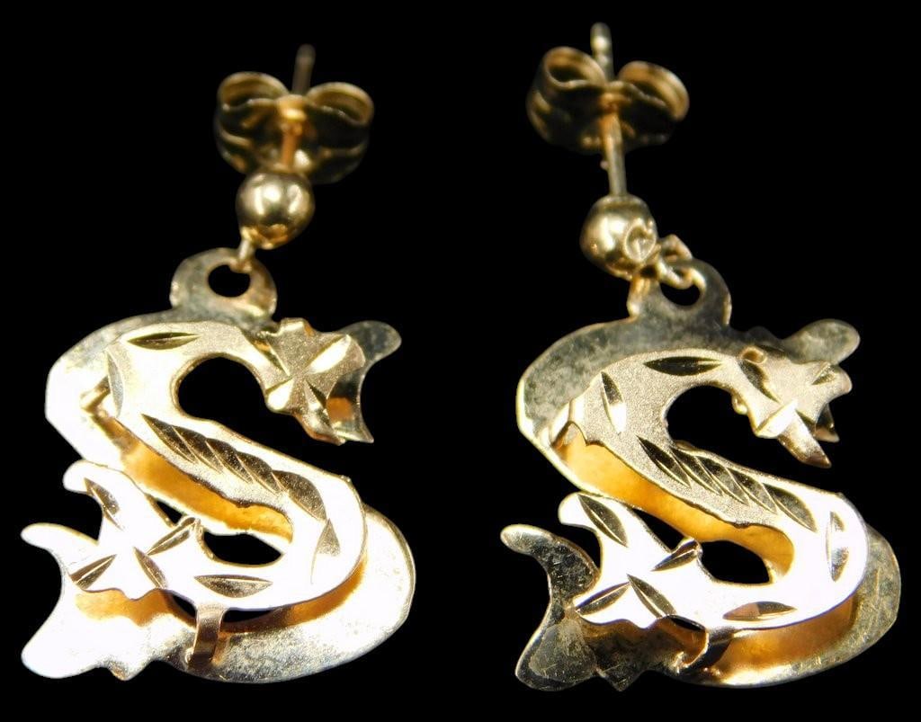 14K Yellow Gold "S" Motif Drop Earrings w/ Stud Backs: Earrings crafted from 14K yellow gold, featuring an intricate dragon motif shaped in an S design The earrings are secured with push-back stud fastenings and include dangling elements They maintain goo