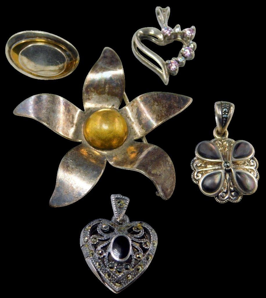 Grouping of Various Sterling Silver Jewelry Pieces, (5): Each is marked as shown Includes three pendants including locket, one floral brooch, and one lone earring All for one money 17.85 dwt total weight Ready to wear or scrap