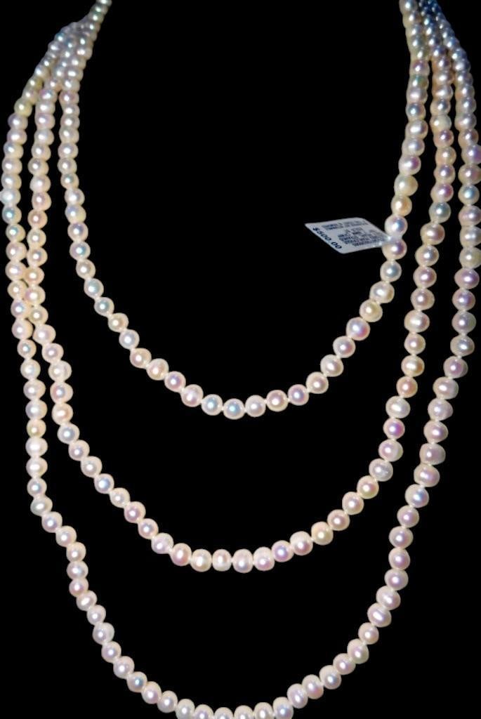 100" Cultured Freshwater Pearl Necklace w/ 7-8mm Pearls, New: Triple-strand necklace crafted from cultured freshwater pearls measuring 7-8mm in diameter The pearls exhibit an opaque finish with lustrous overtones of soft pink, white, and ivory Necklace has an