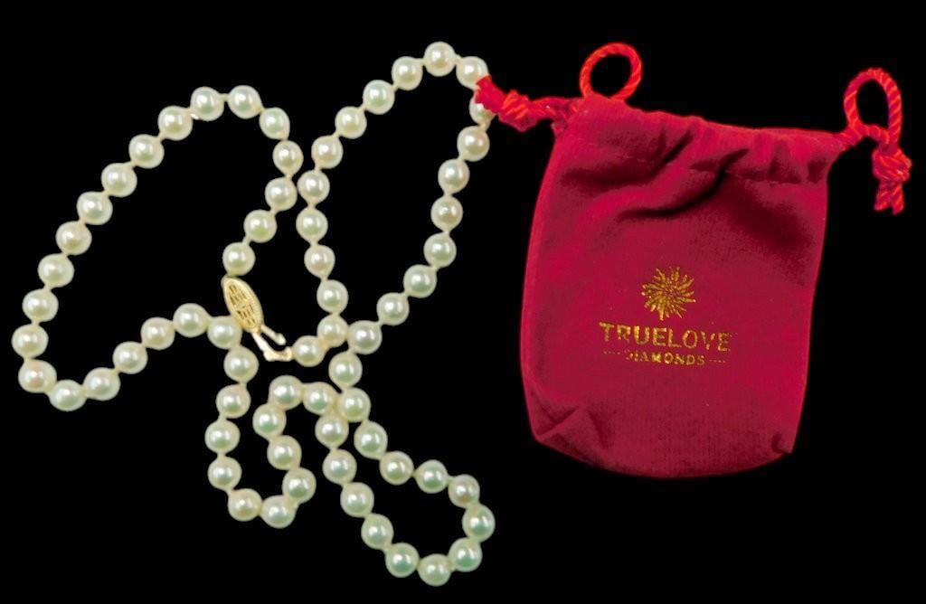 Pearl Necklace Strand w/ 14K Clasp and a Loose Topaz Stone: Truelove Diamonds Pearl Necklace with Clasp and Loose Topaz Gemstone Includes red velvet pouch Both for one money 18 inches L