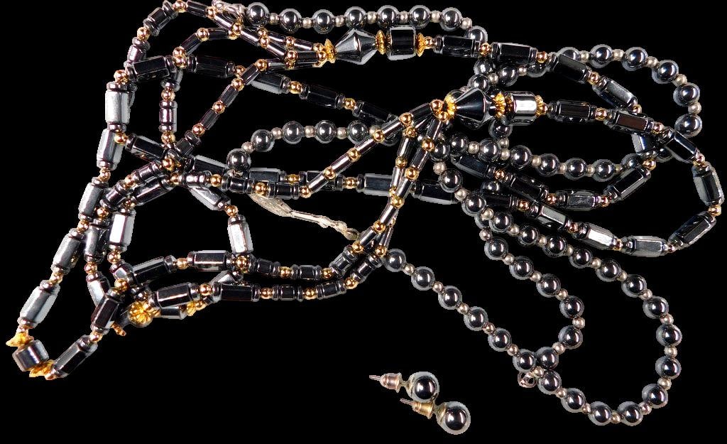 Hematite Jewelry Set w/ Gold-Tone Accents, Necklace, Bracelet, and Earrings: Hematite jewelry set including one multi-strand necklace with cylindrical and gold-tone accents, one beaded hematite single-strand necklace, one coordinating bracelet, and a pair of hematite bead earr