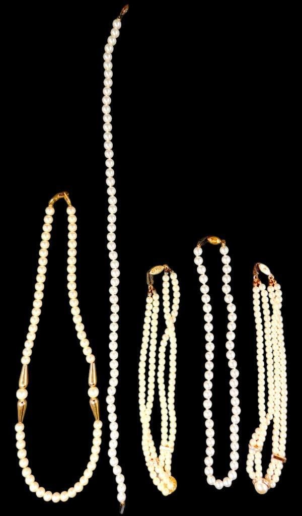 Faux Pearl Necklaces w/ Gold-Tone AccentsGrouping, (5): Five faux pearl necklaces in varying designs, featuring gold-tone accents and barrel-style or filigree clasps The collection includes single-strand and multi-strand configurations, with beads of