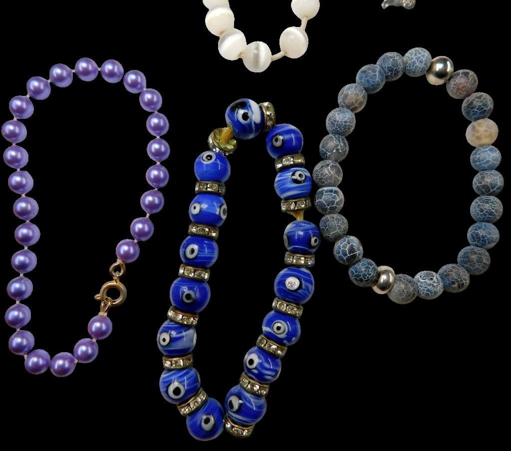 Grouping of Costume Jewelry Earrings and Bracelets - 10