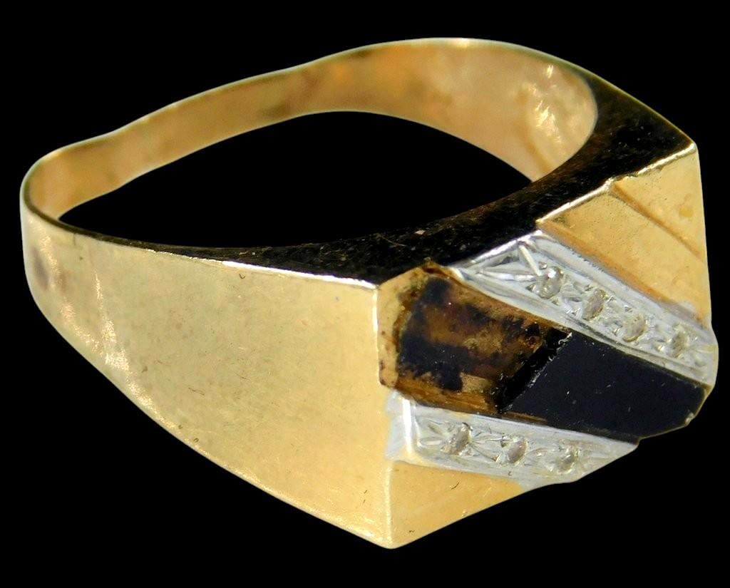 14K Gold Men's Ring Featuring Black Stone and Diamond Accents, Marked: 14K Gold ring with a rectangular black stone centerpiece flanked by small diamond-like accent stones set in silver-tone bands The ring is constructed with a flat band design and includes a marked inte