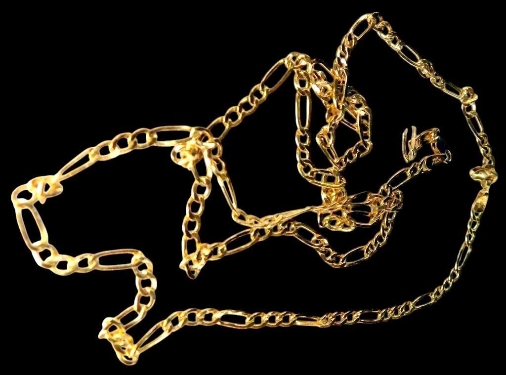14k Italian Yellow Gold Figaro Link Chain Necklace: 14K Italian yellow gold chain necklace featuring a classic Figaro link design Marked 14K and Italy on the clasp, confirming gold purity and origin The chain is equipped with a lobster clasp for secure