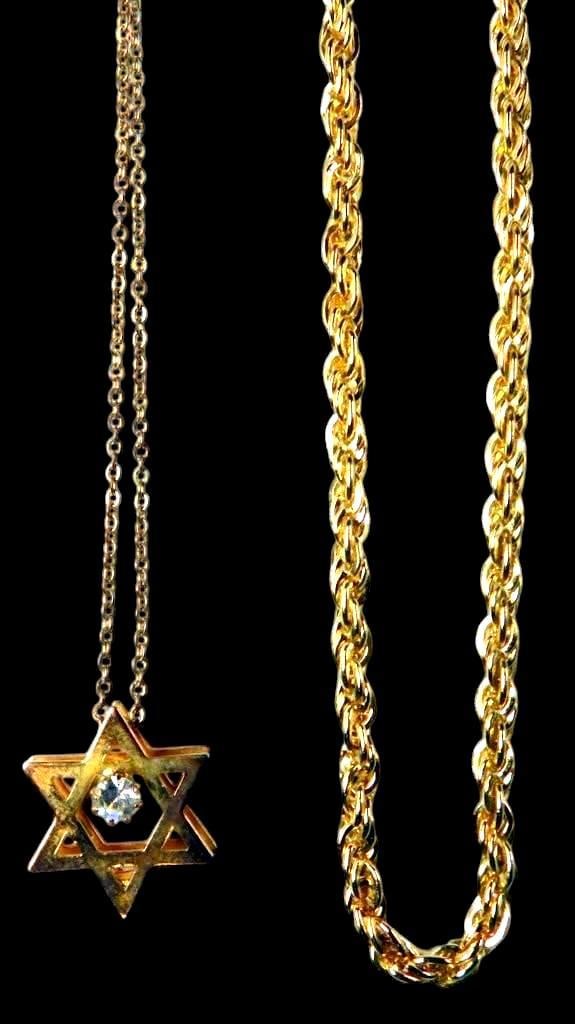 Gold-Tone Necklaces Including Star of David Pendant and Chain: Includes a gold-tone chain with an interlocking link design and a gold-tone chain featuring a Star of David pendant The Star of David pendant is adorned with a central clear rhinestone or gem on 17