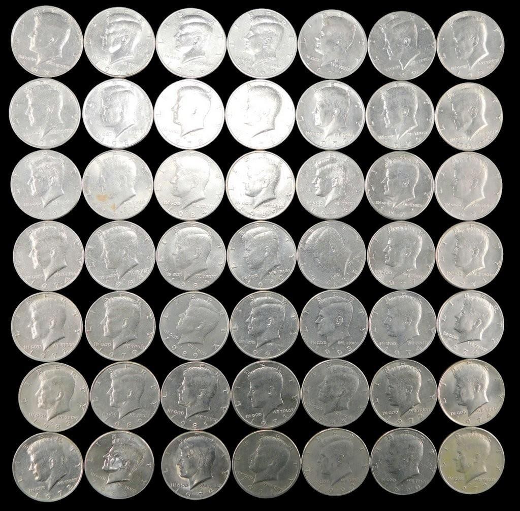 49 Kennedy Half Dollars - Mixed Dates and Mint Marks: 49 Kennedy half dollar coins featuring mixed dates and mint marks Coins are United States legal tender Most are composed of copper-nickel clad These are all post-1964 (not silver) coins Coins exhibit