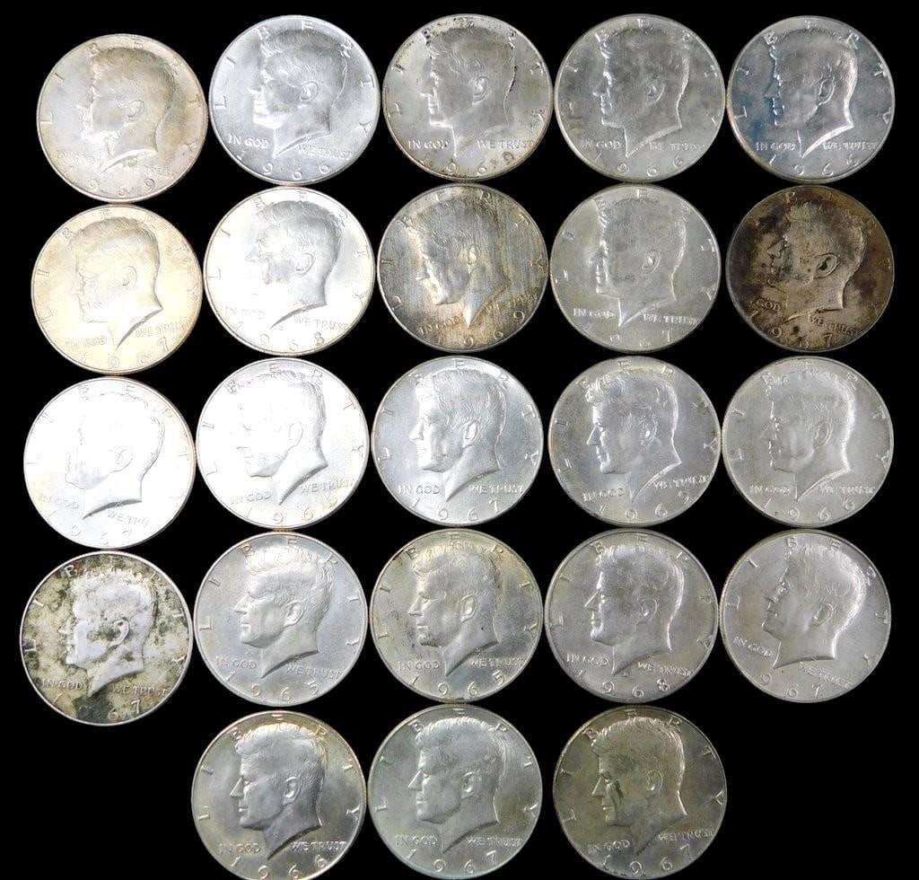 23 Kennedy Silver Half Dollars, 1965-1969: 23 Kennedy half dollars featuring various dates as shown Coins display circulated condition with varying degrees of toning and wear Composition includes 40% silver for coins minted between 1965-1970
