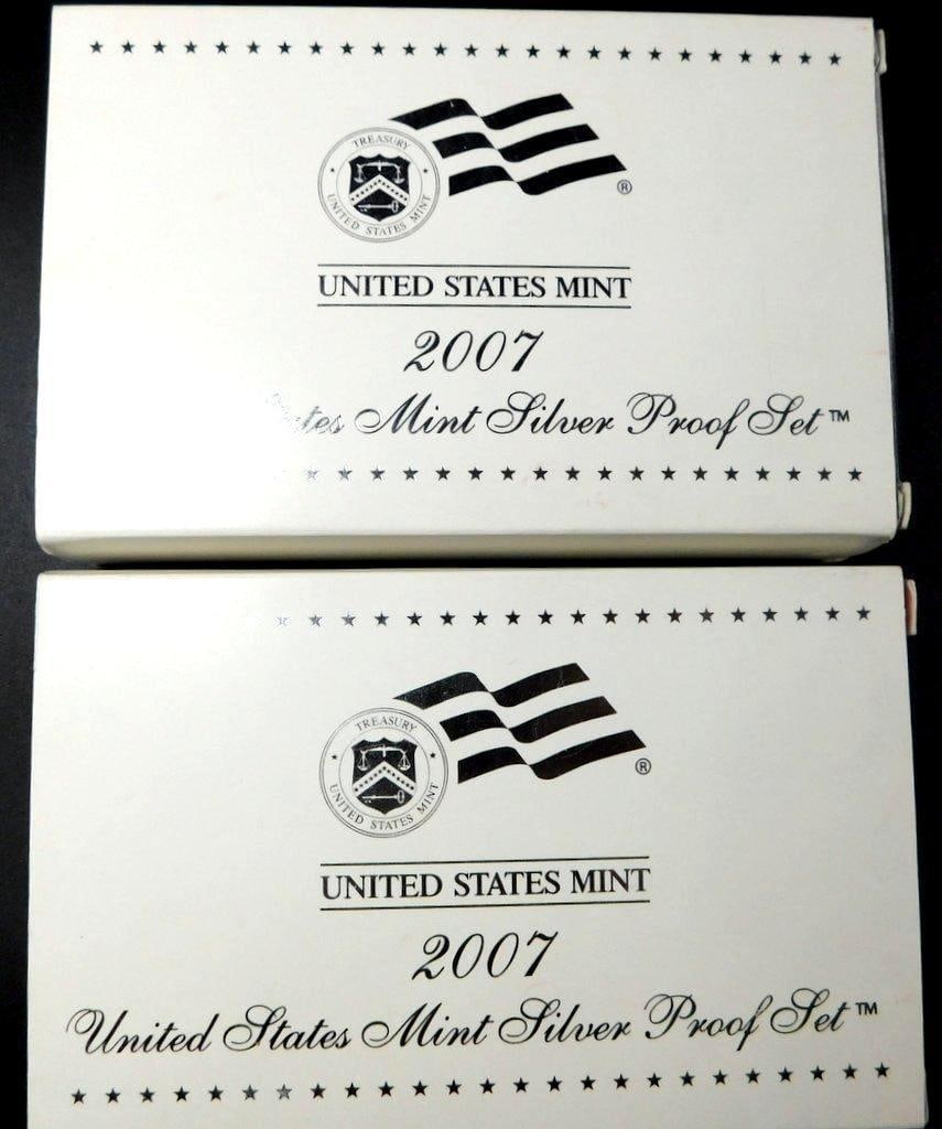 2007 United States Mint Silver Proof Sets with Original Packaging, (2): Two 2007 United States Mint Silver Proof Sets, each including original boxes, sleeves, and certificates of authenticity Each set contains proof coins minted in 2007 with 90% silver content Coins are h