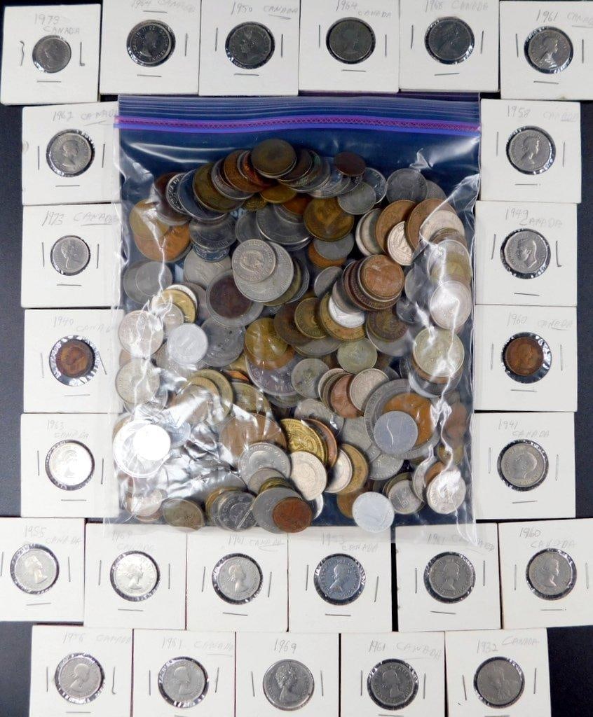 Large Grouping of Canadian and World Coins in Holders and Bag: World coins, including Canadian coins in protective holders dating from the 1930s to 1970s, with each holder labeled by year and origin Includes a variety of denominations and designs, featuring