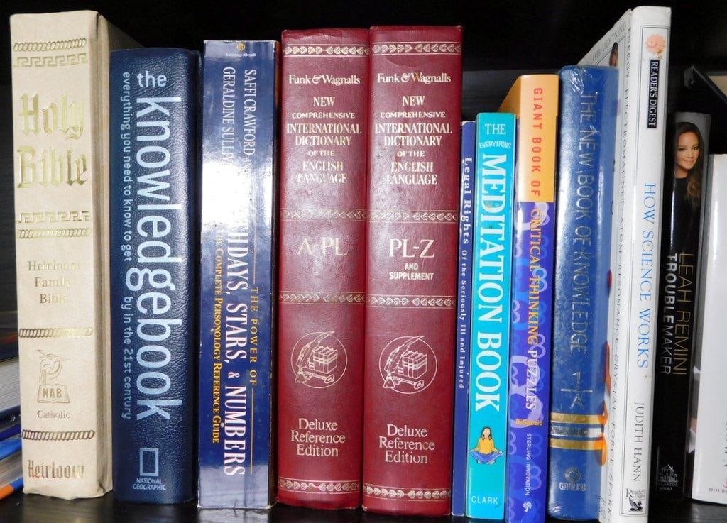 Books Including Dictionaries, Art, and Knowledge Titles: A diverse collection of 13 books featuring subjects such as dictionaries, literature, meditation, art, science, and religion Notable works include Funk & Wagnalls New Comprehensive International